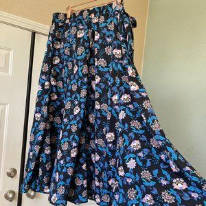 Flowy floral midi skirt with front button closure and side tie